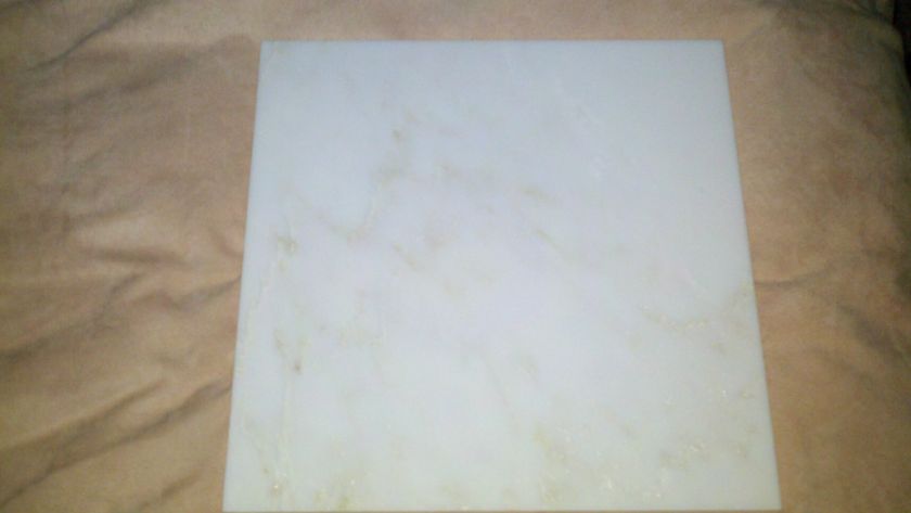 Box of polished White Marble tile 12x12x3/8 with subtle gold veining 
