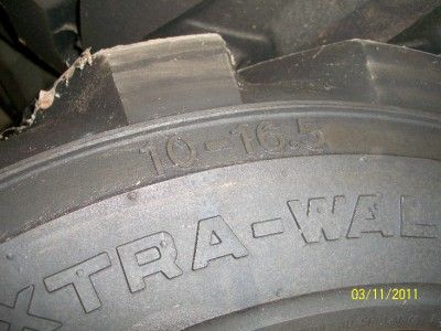 JOHN DEERE SKID STEER TIRES AND RIMS 10 16.5 SET 4  